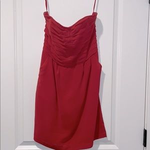 Red sleeveless pocket dress